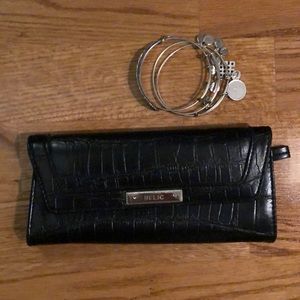 ♦️SOLD Relic Tri-fold Clutch